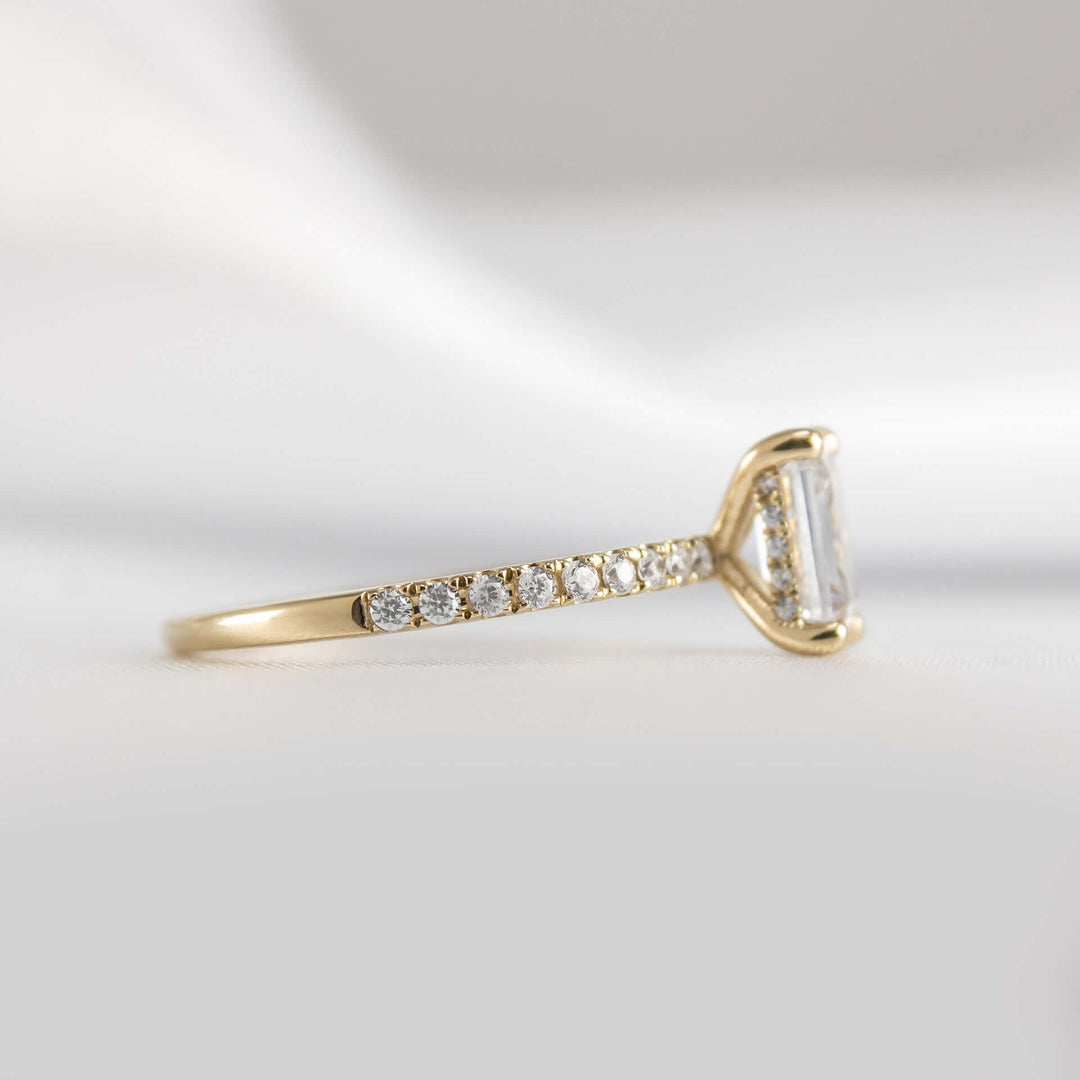 Emerald Cut Hidden Halo Ring with Pave Band