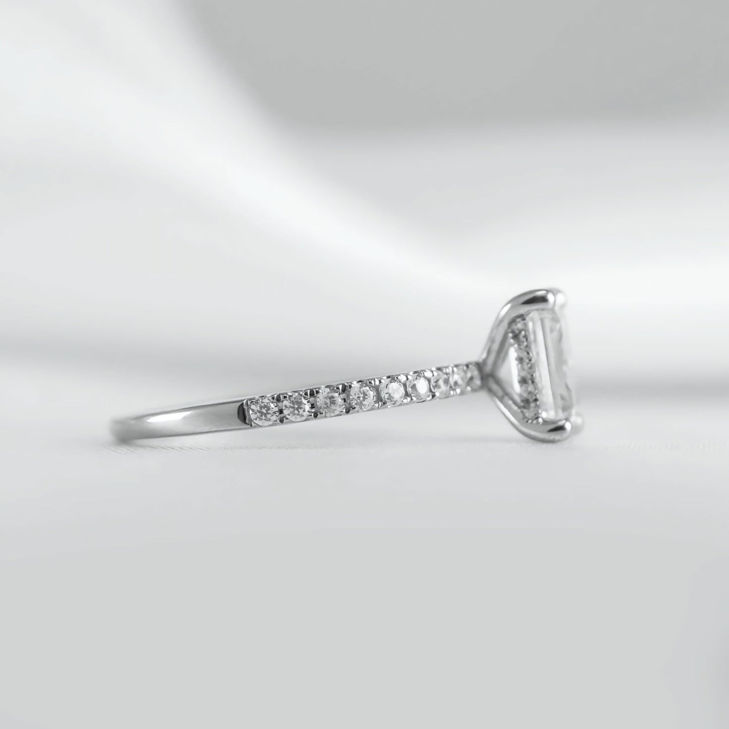 Emerald Cut Hidden Halo Ring with Pave Band