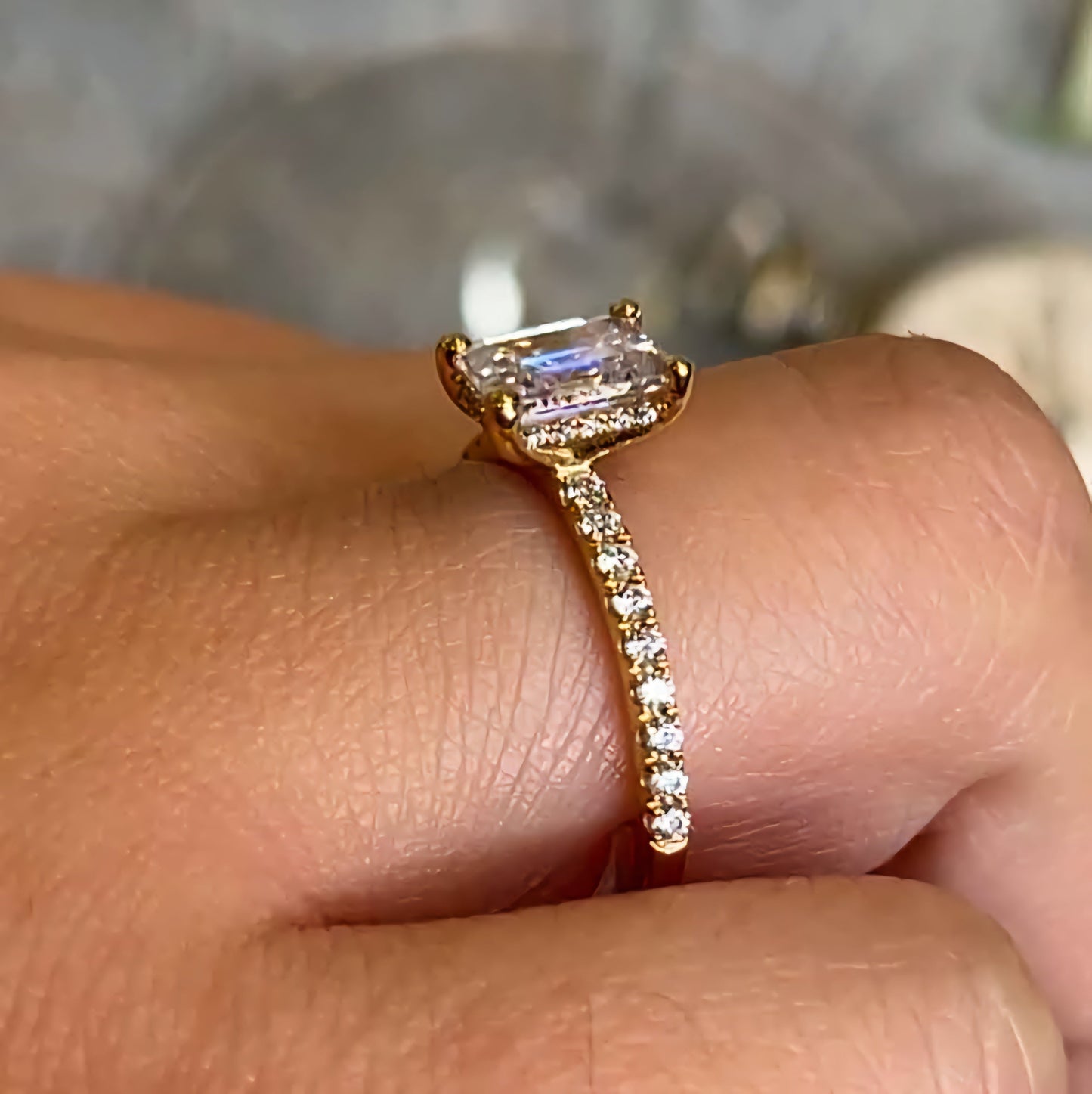 Emerald Cut Hidden Halo Ring with Pave Band