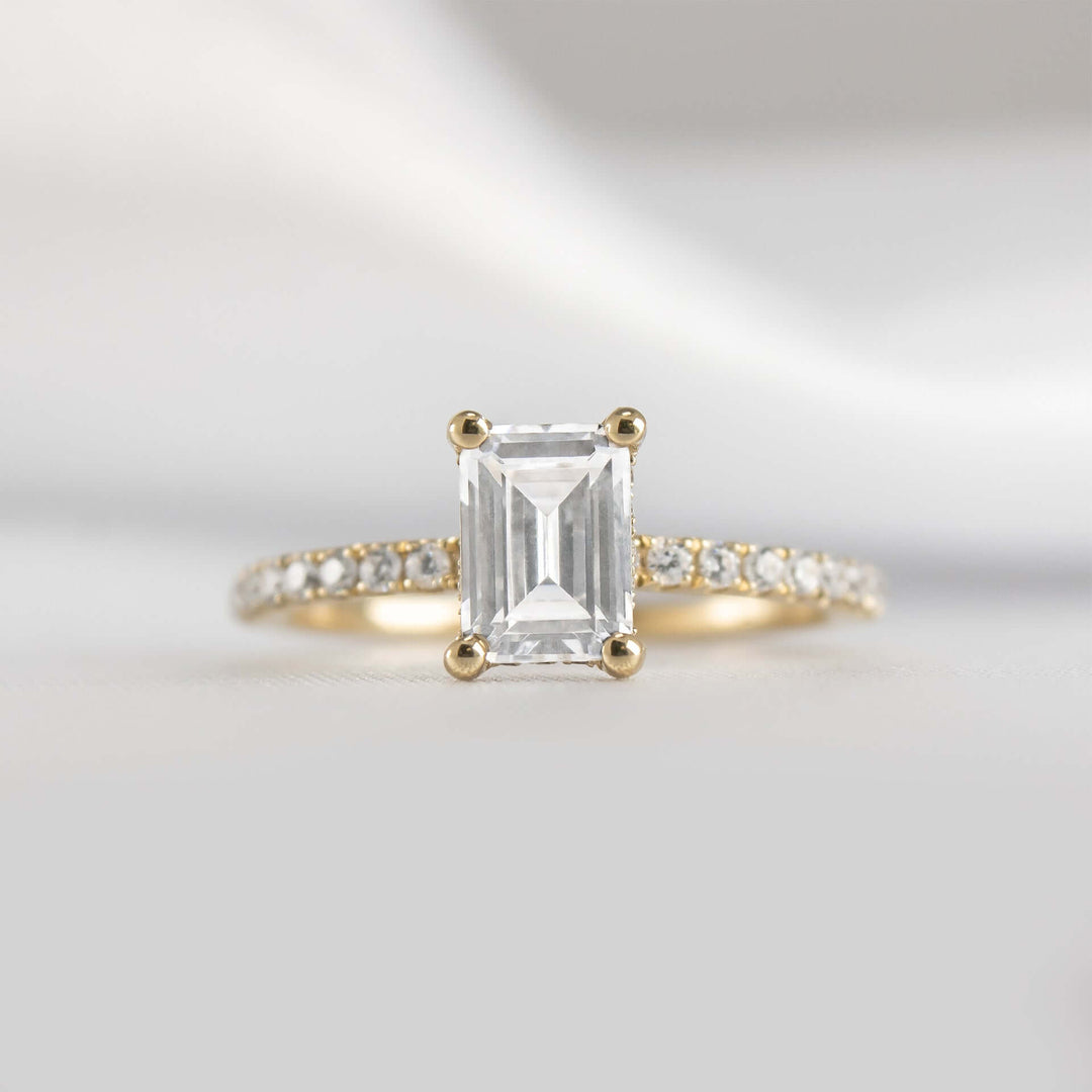 Emerald Cut Hidden Halo Ring with Pave Band