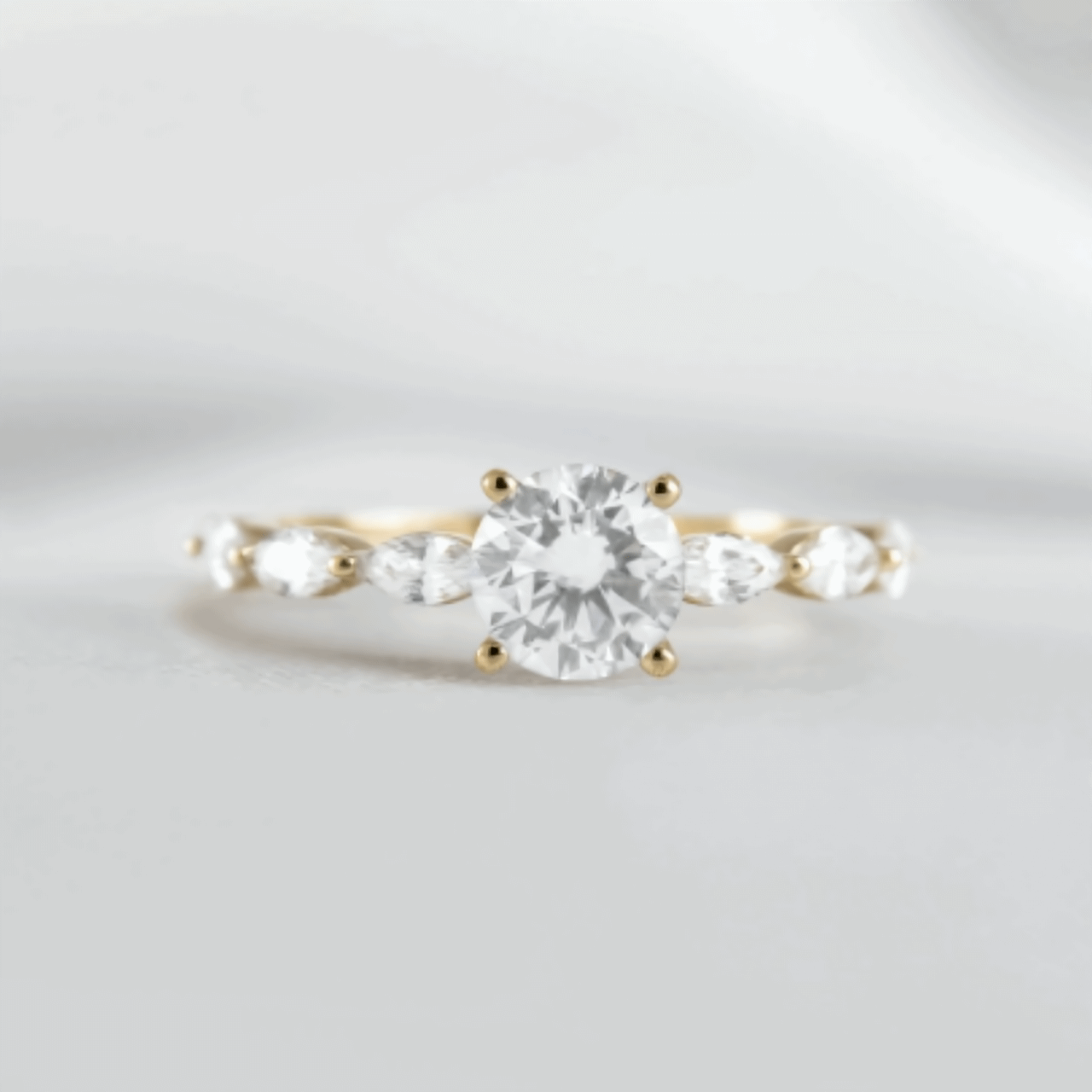 Round Solitaire Ring with Marquise Band