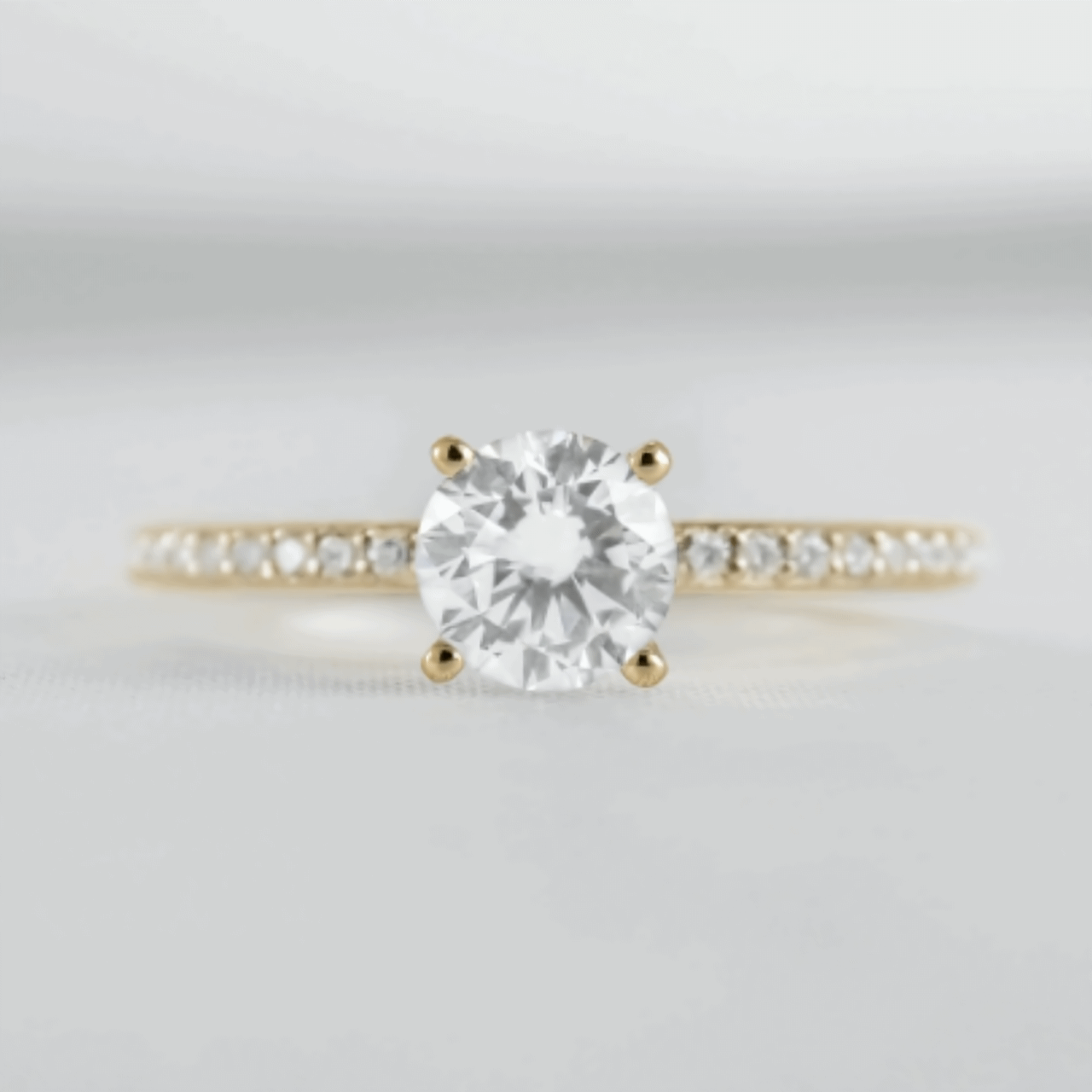 Round Solitaire Ring with Pave Band