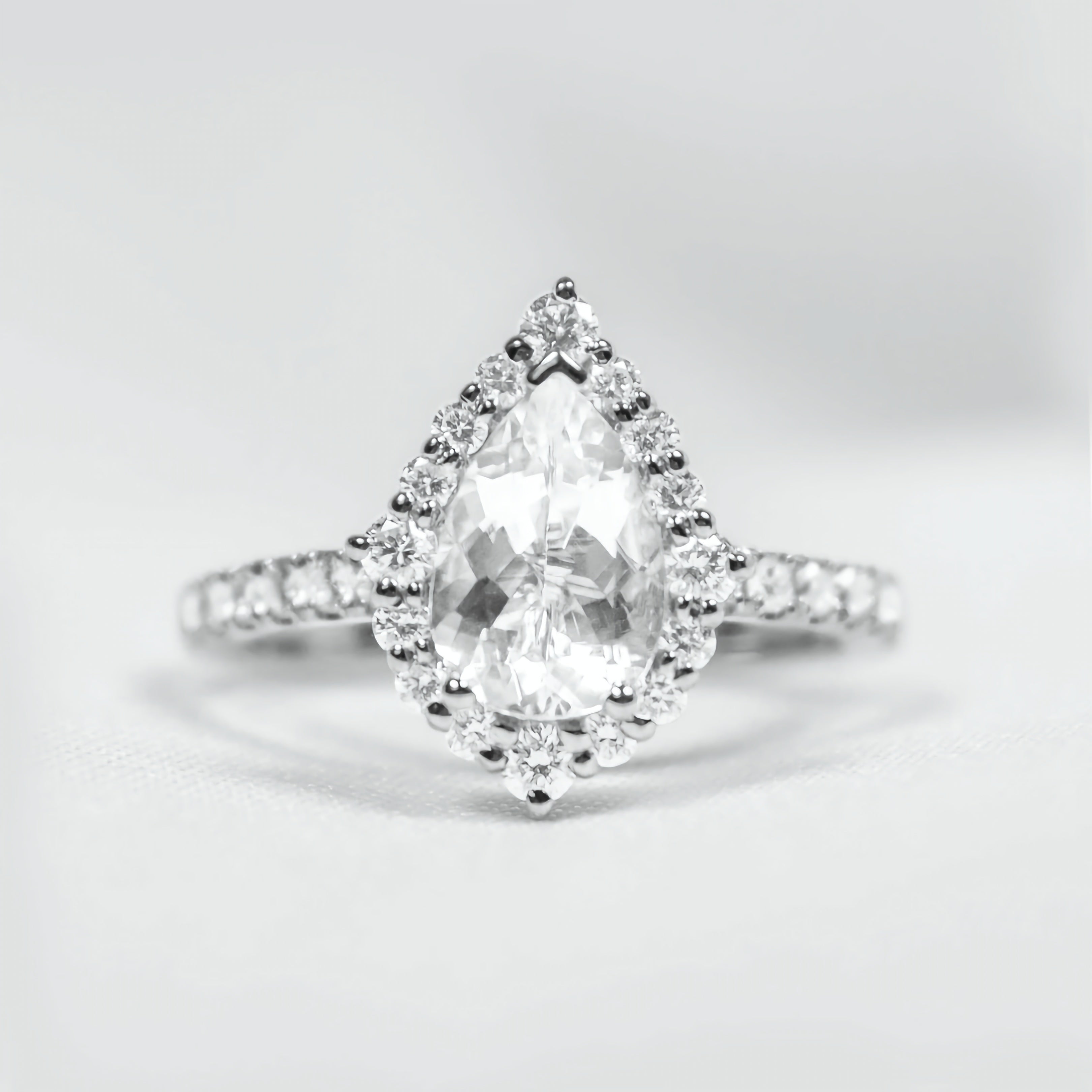 Pear Shape Halo Ring with Pave Band