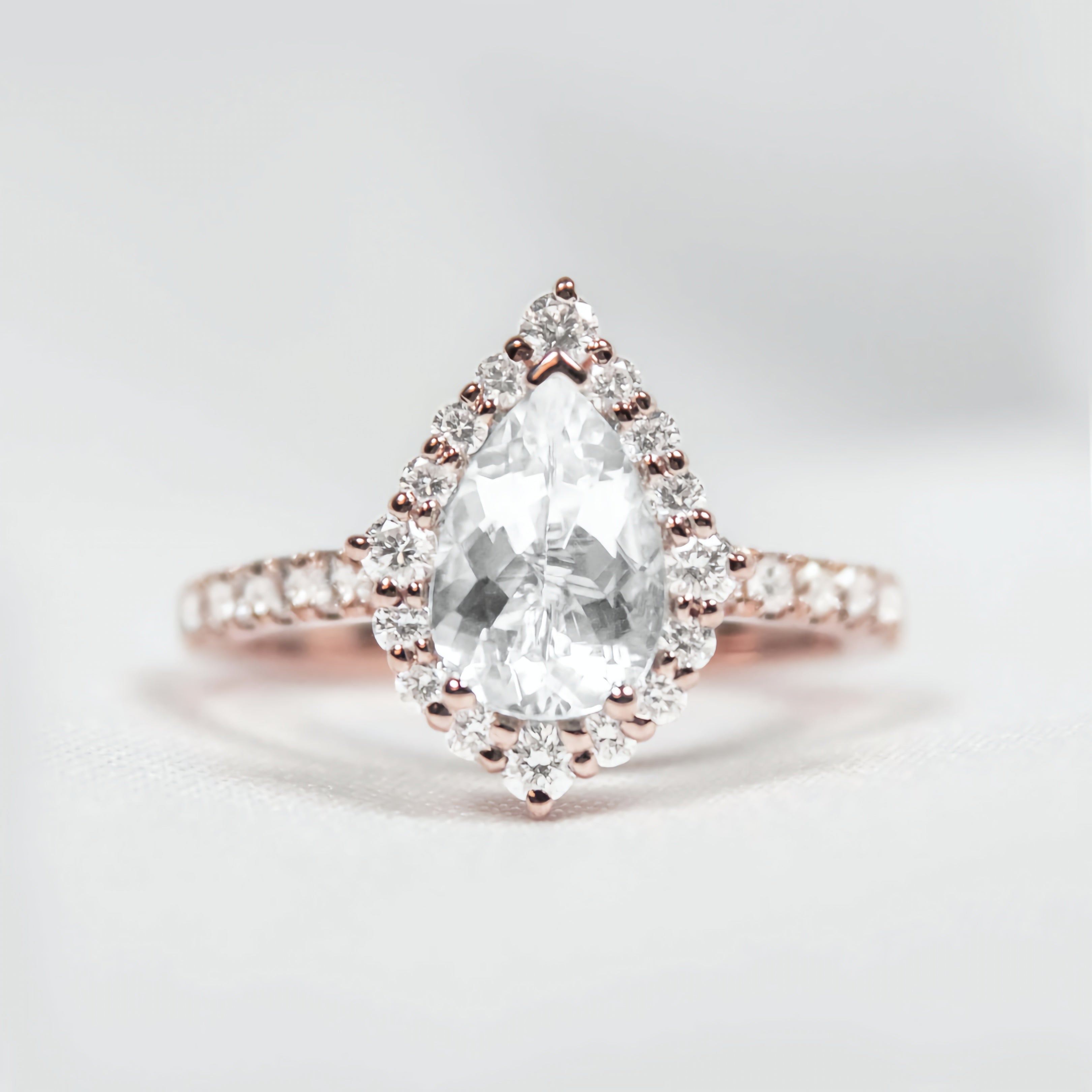 Pear Shape Halo Ring with Pave Band