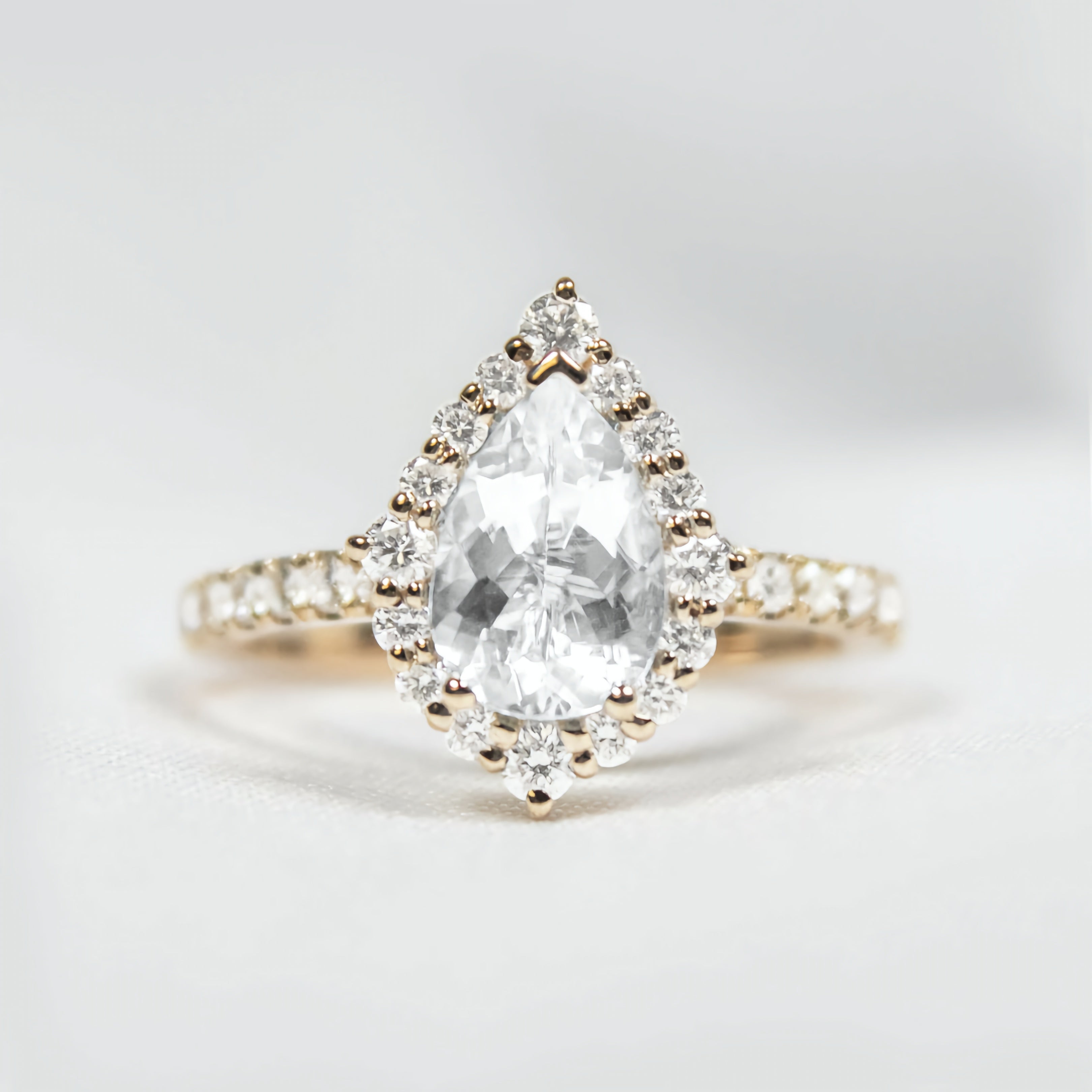 Pear Shape Halo Ring with Pave Band