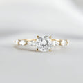 Round Solitaire Ring with Marquise Band