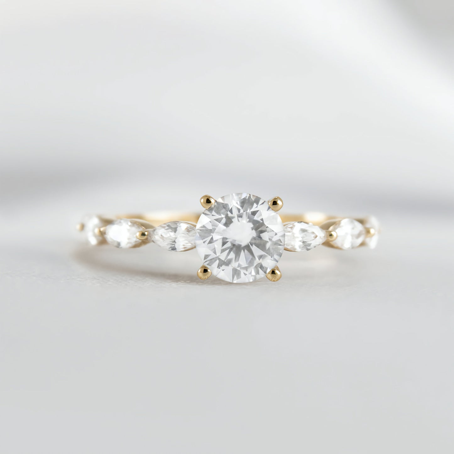 Round Solitaire Ring with Marquise Band