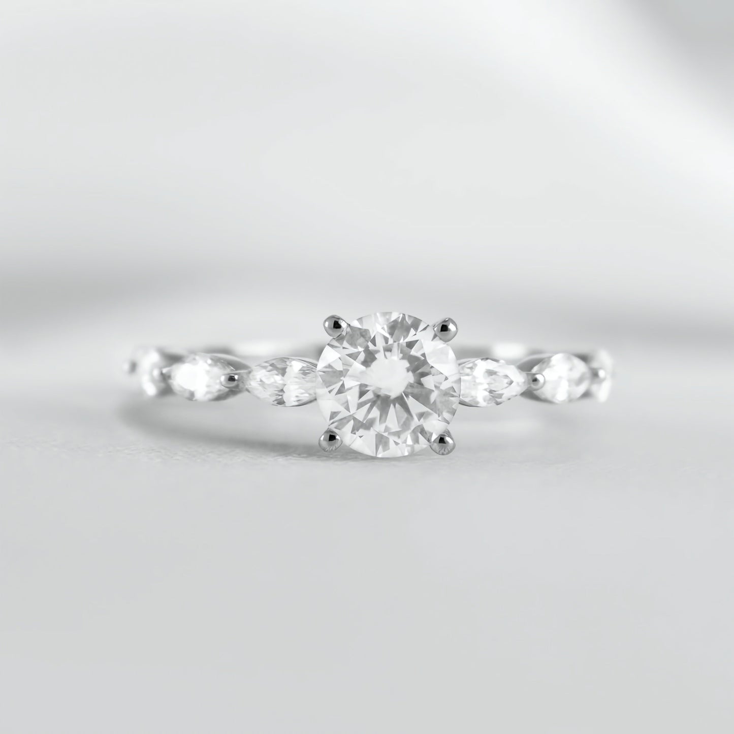 Round Solitaire Ring with Marquise Band