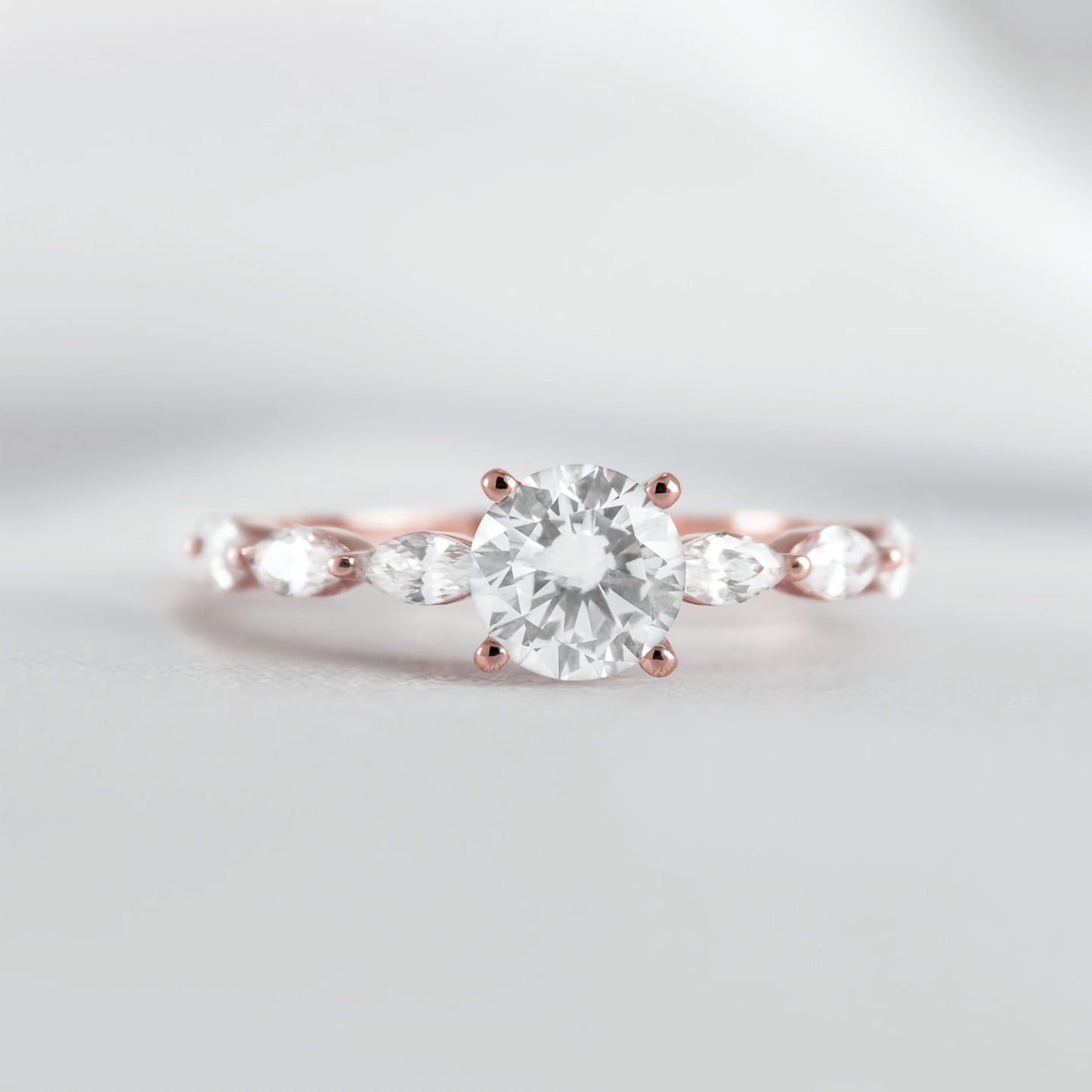 Round Solitaire Ring with Marquise Band