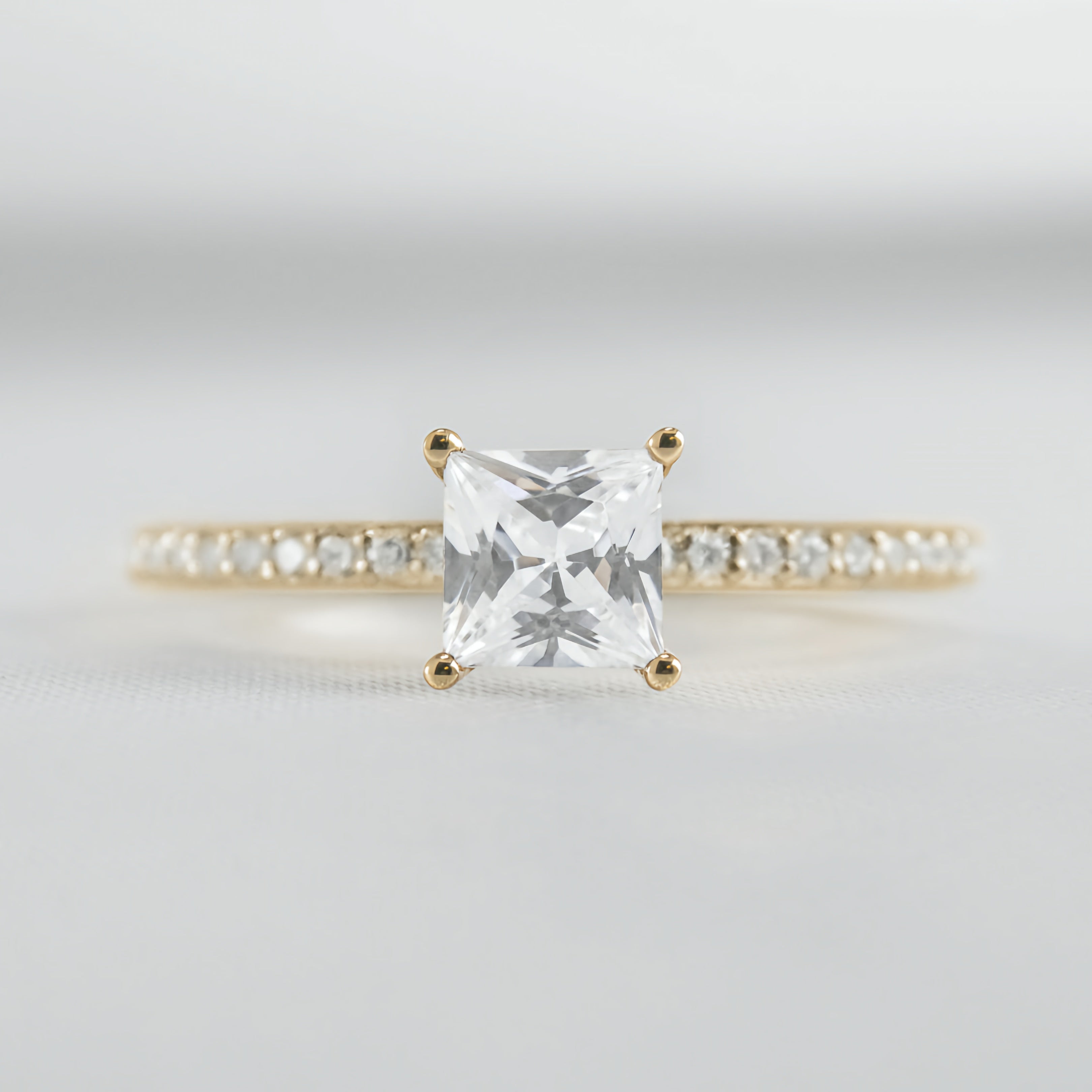 Round Solitaire Ring with Pave Band