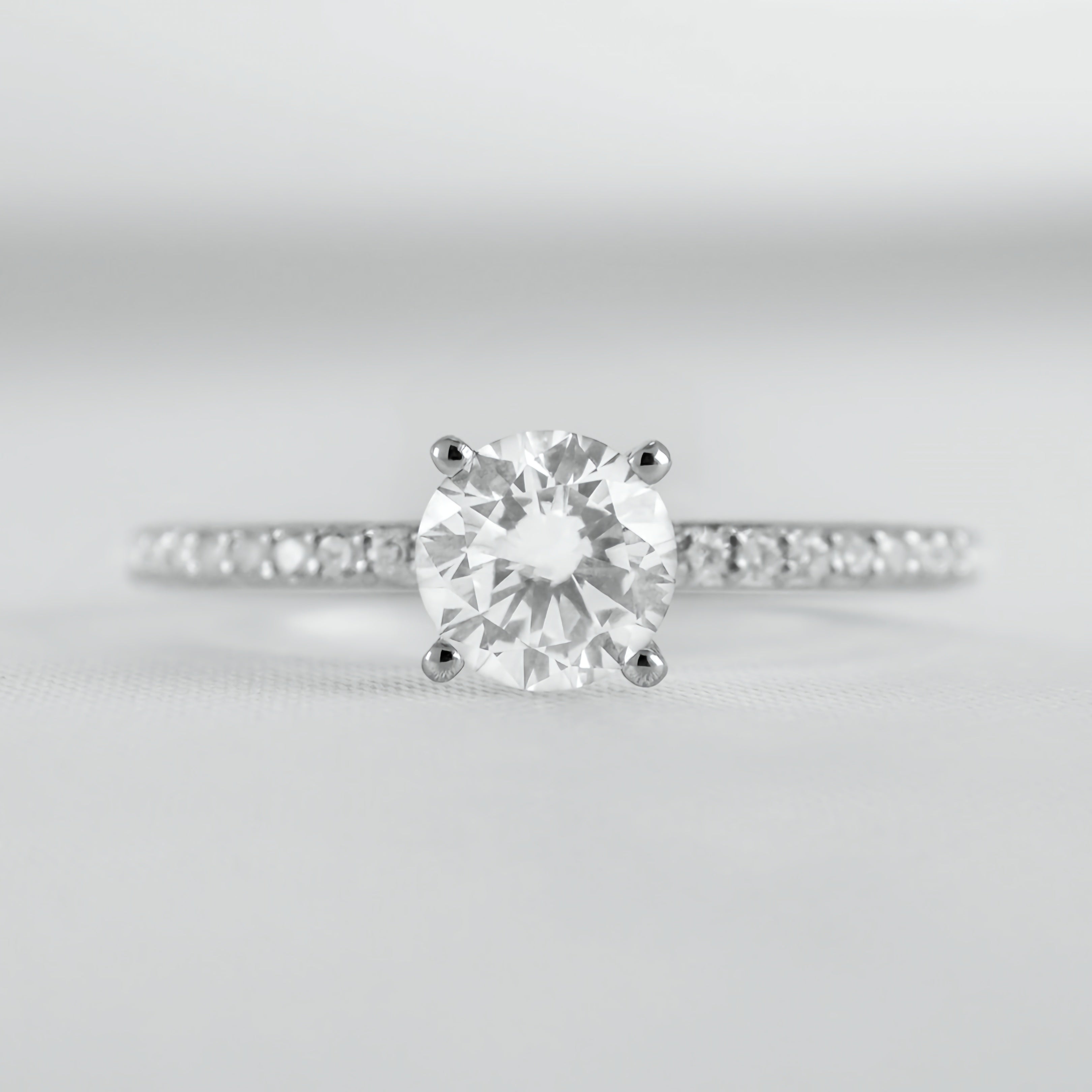Round Solitaire Ring with Pave Band