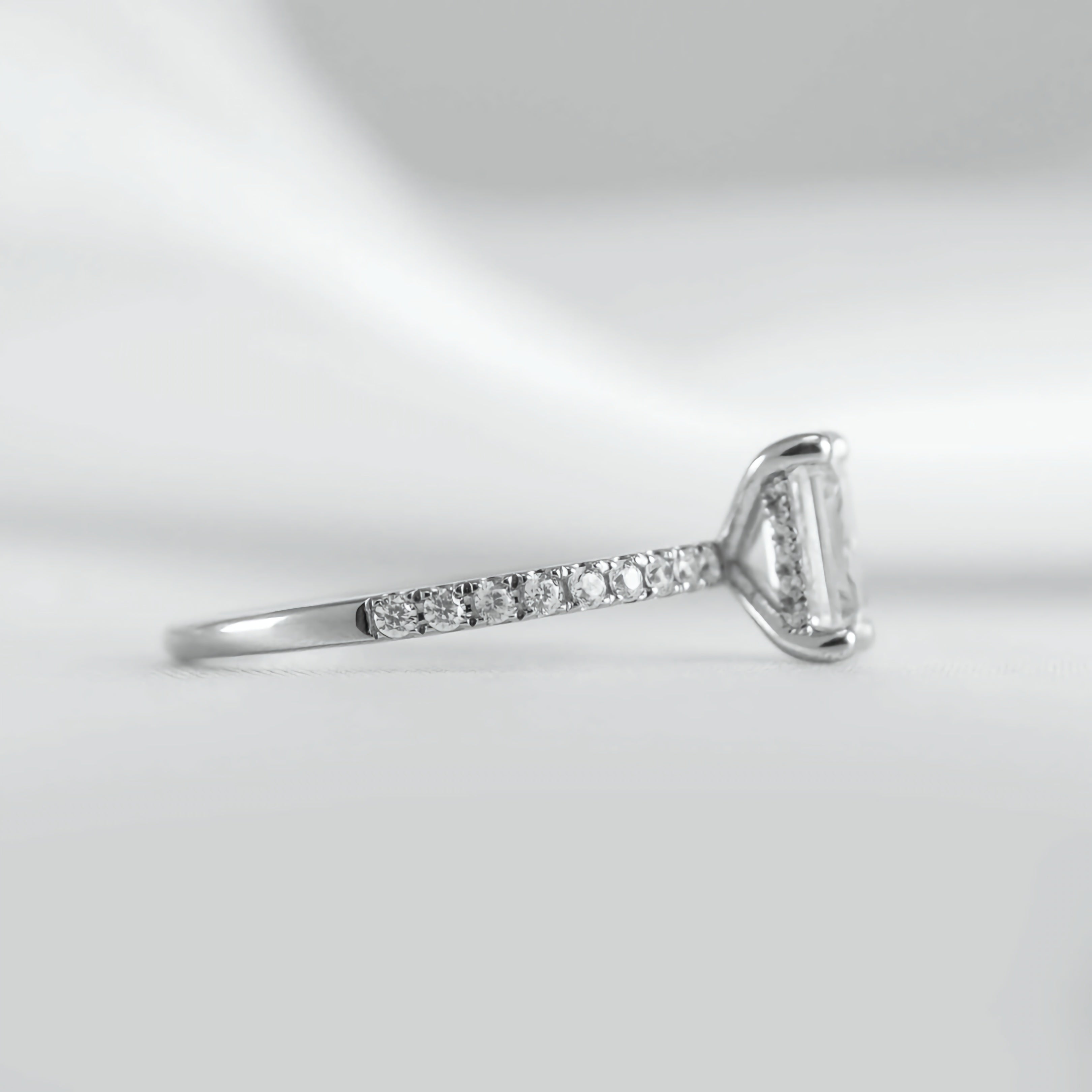 Emerald Cut Hidden Halo Ring with Pave Band