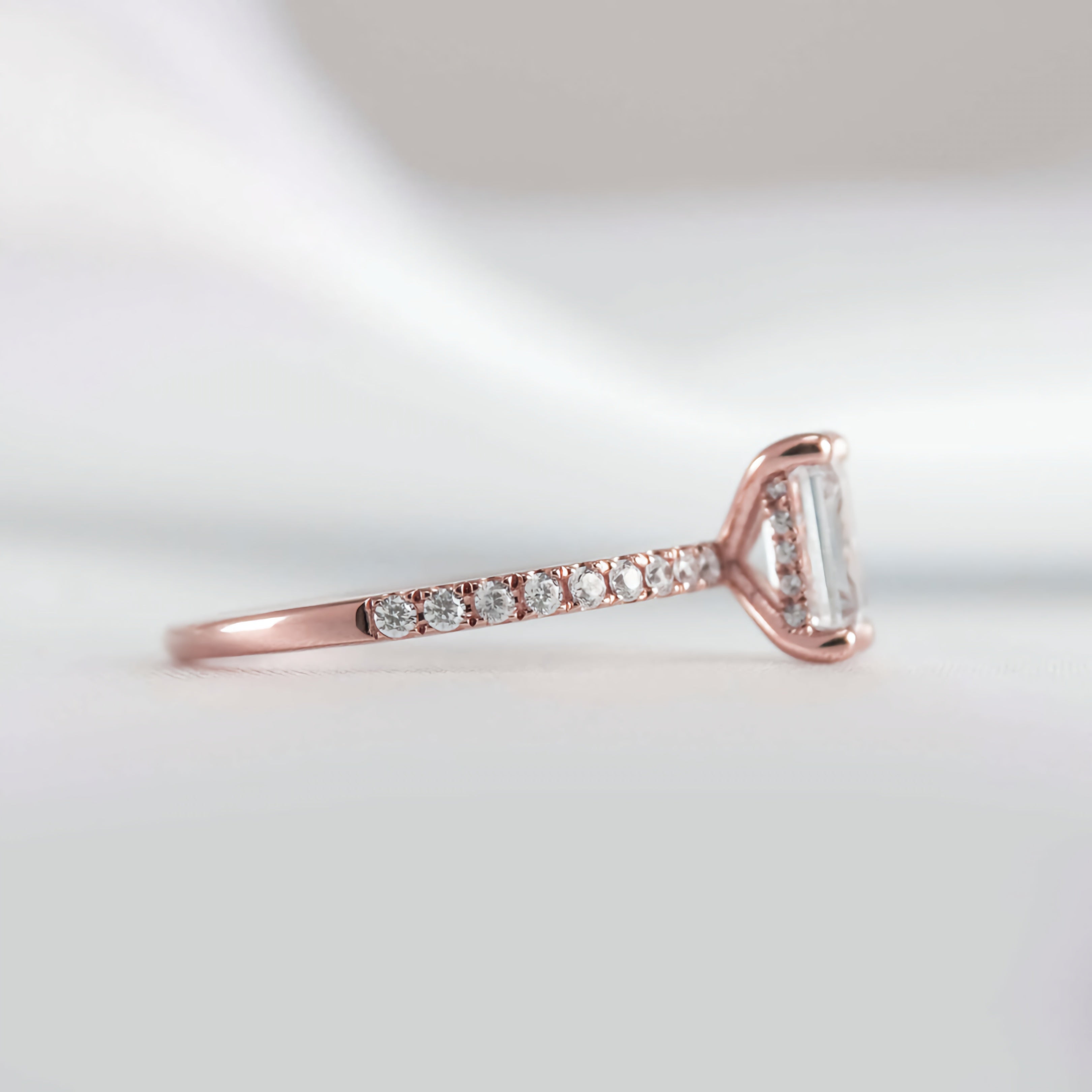 Emerald Cut Hidden Halo Ring with Pave Band