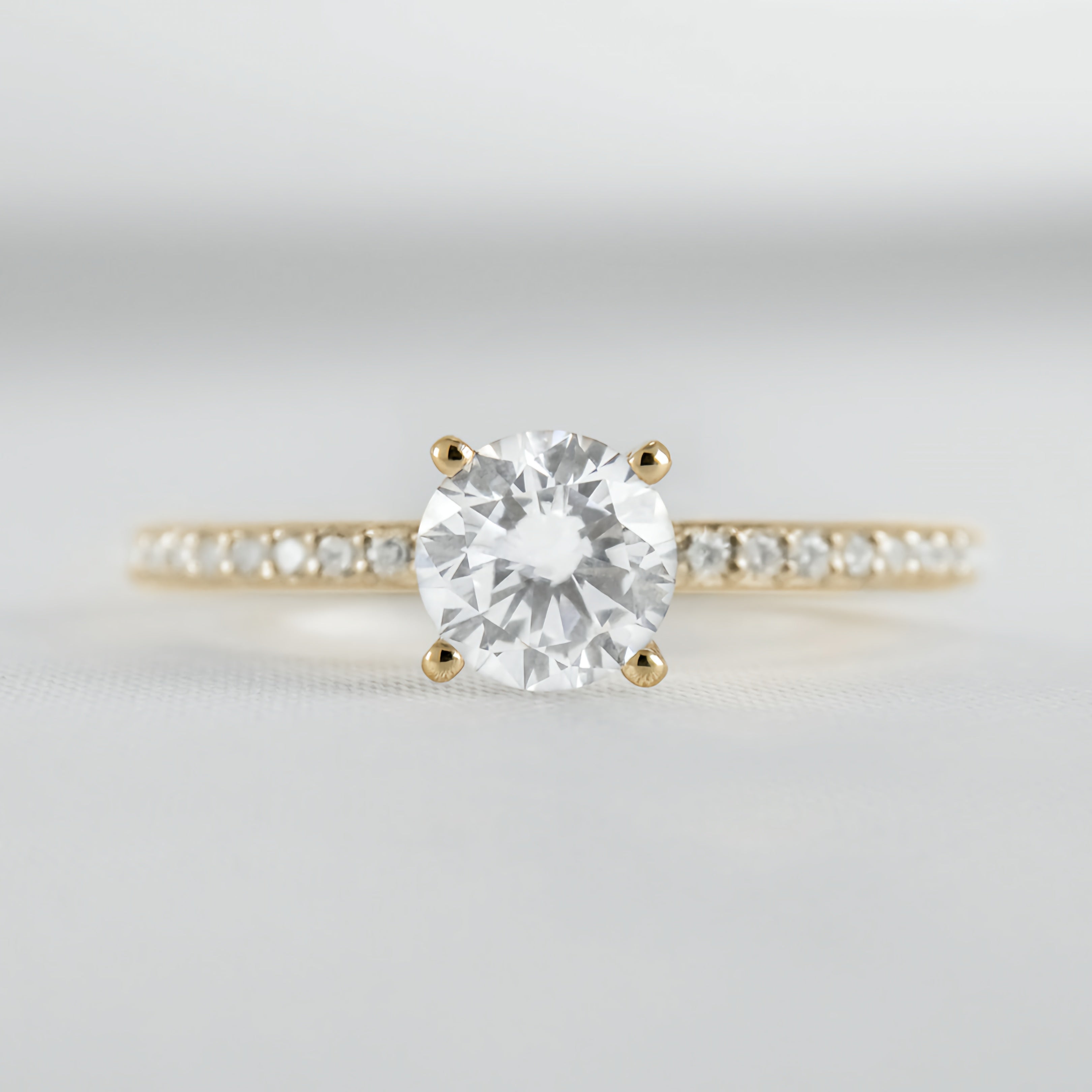 Round Solitaire Ring with Pave Band
